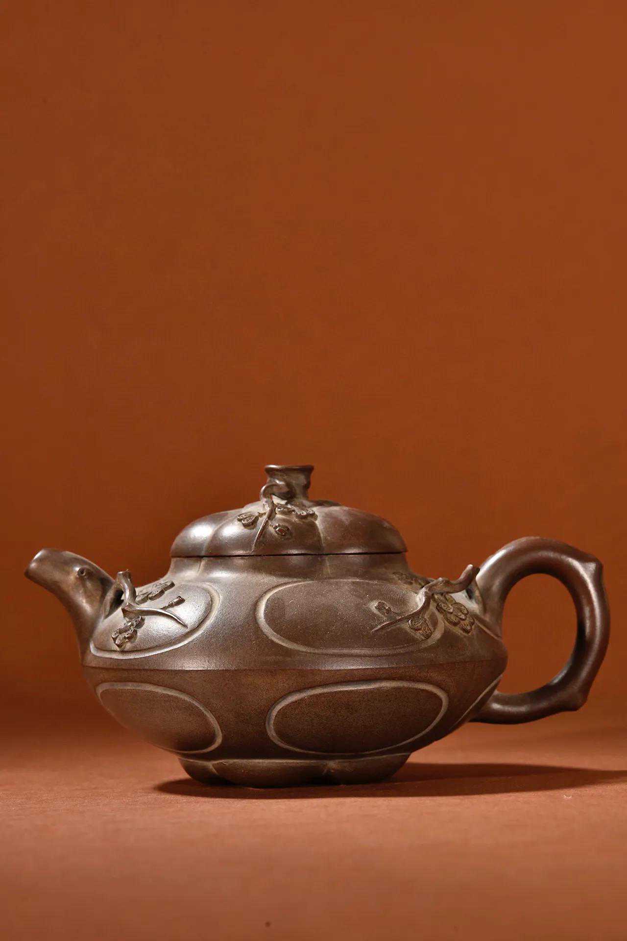 旧藏 紫砂梅花纹茶壶