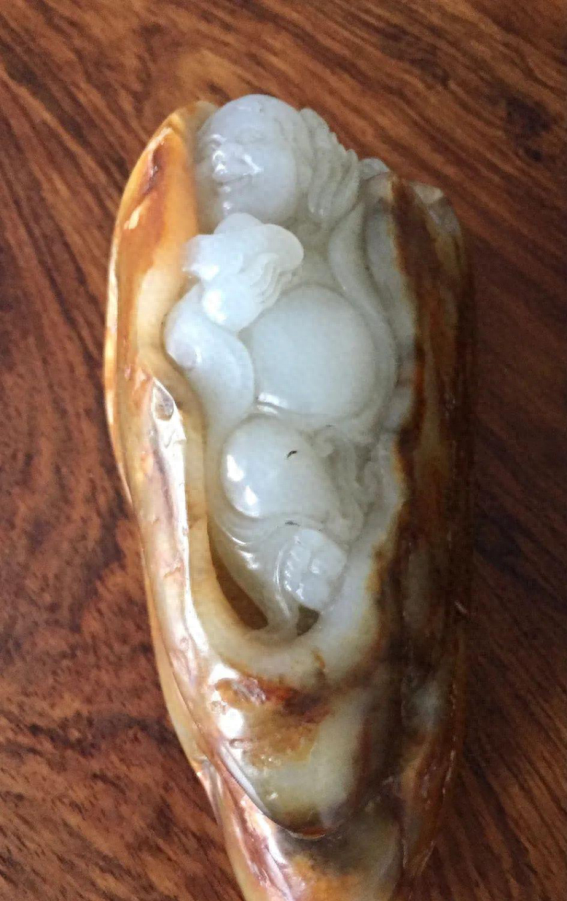 把你收藏的和田玉籽料开水烫一下